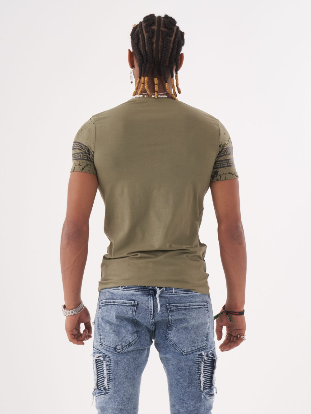 The back view of a man wearing an AFTERLIFE T-SHIRT and jeans.
