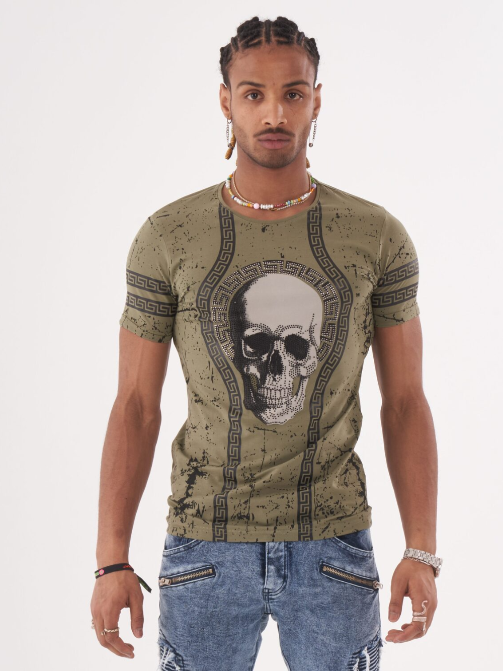 A man wearing an AFTERLIFE T-shirt with a skull on it.