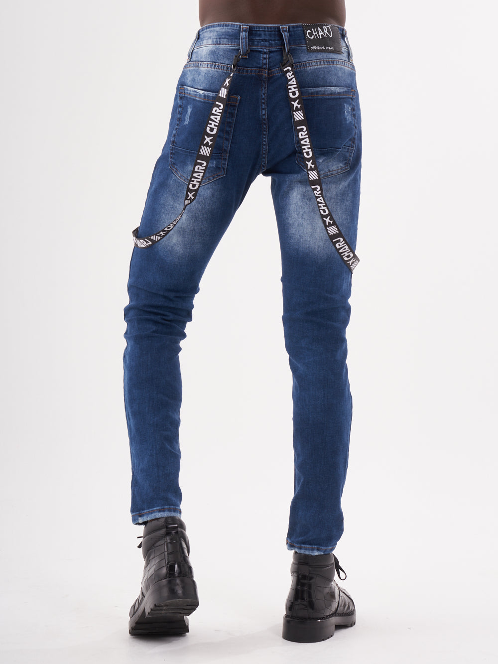 The back view of a man wearing TORNADO BLUE with chain straps.