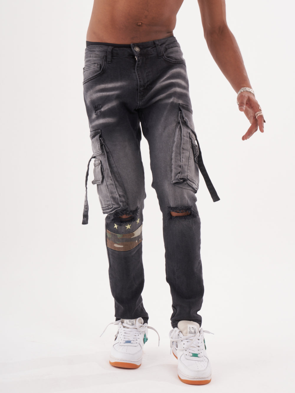 A man wearing the HIPSTER is posing for a photo.