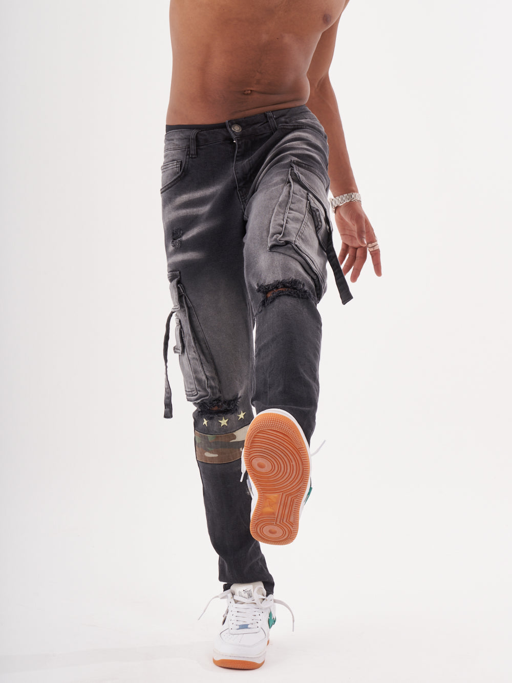 A man wearing a HIPSTER is posing for a photo.