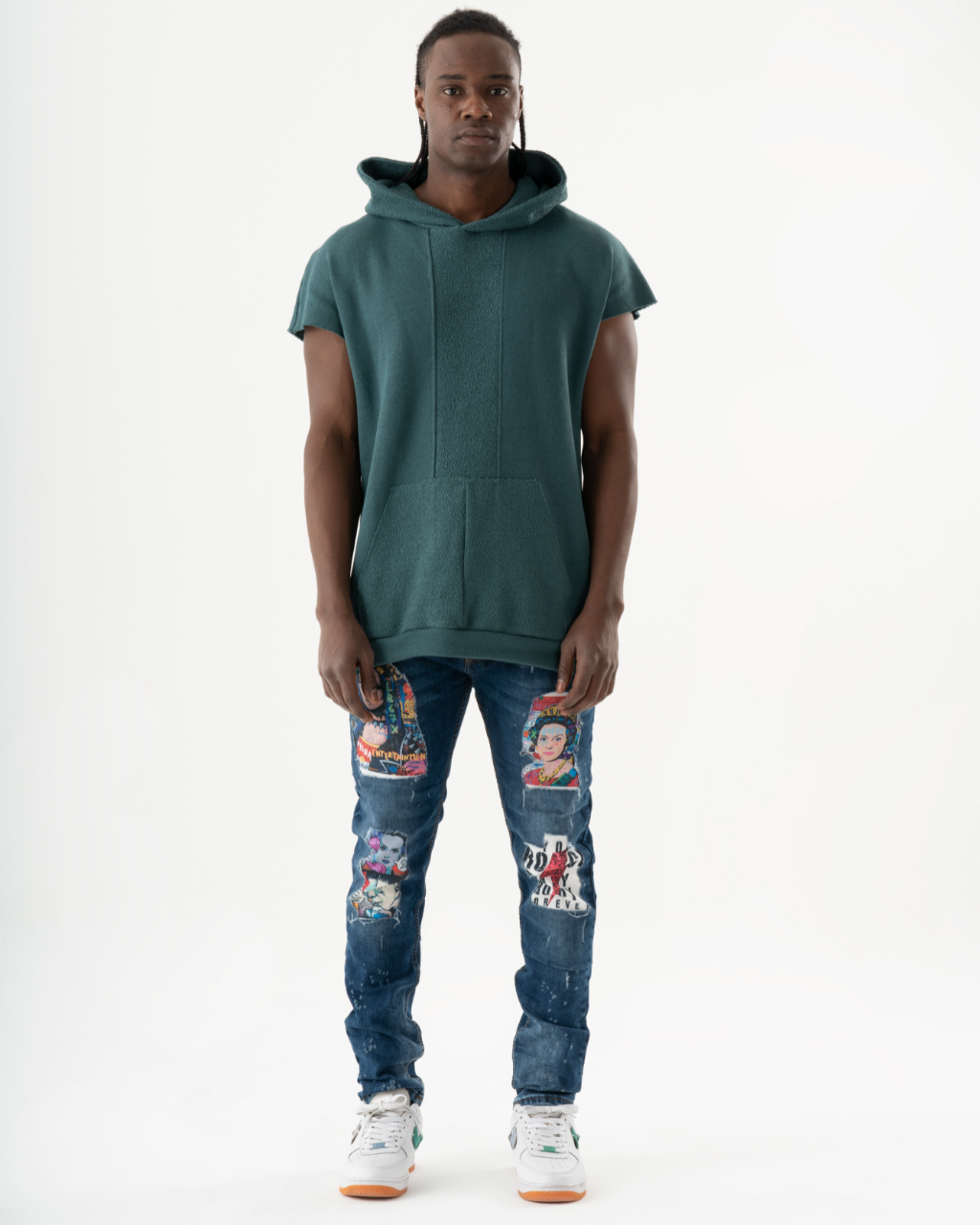 A man wearing CRESCENDO jeans.