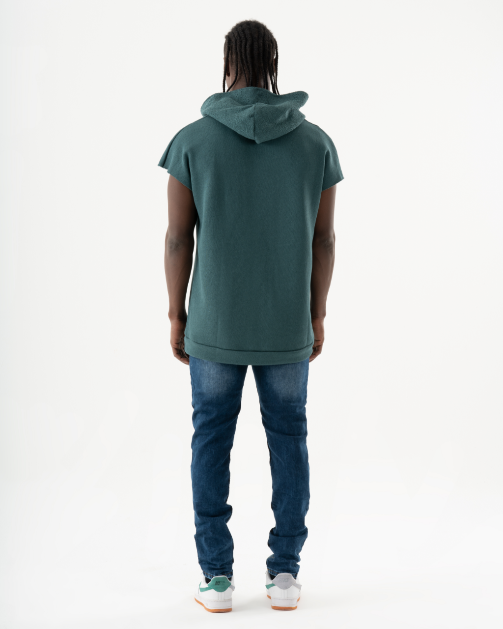 The back view of a man wearing a CRESCENDO at a concert.