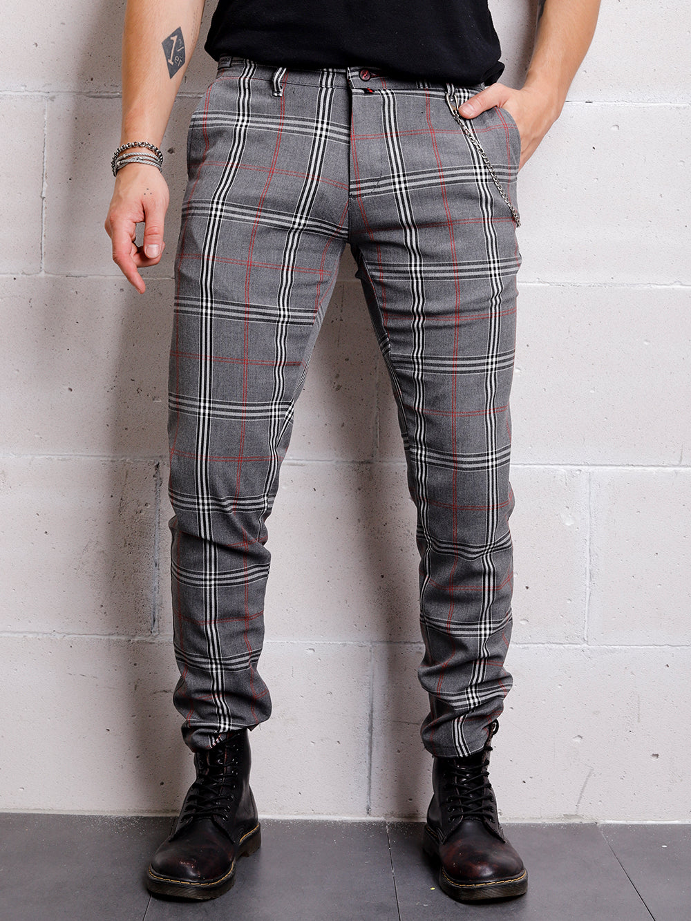 A man wearing a "CHECKERED GREY" chinos.