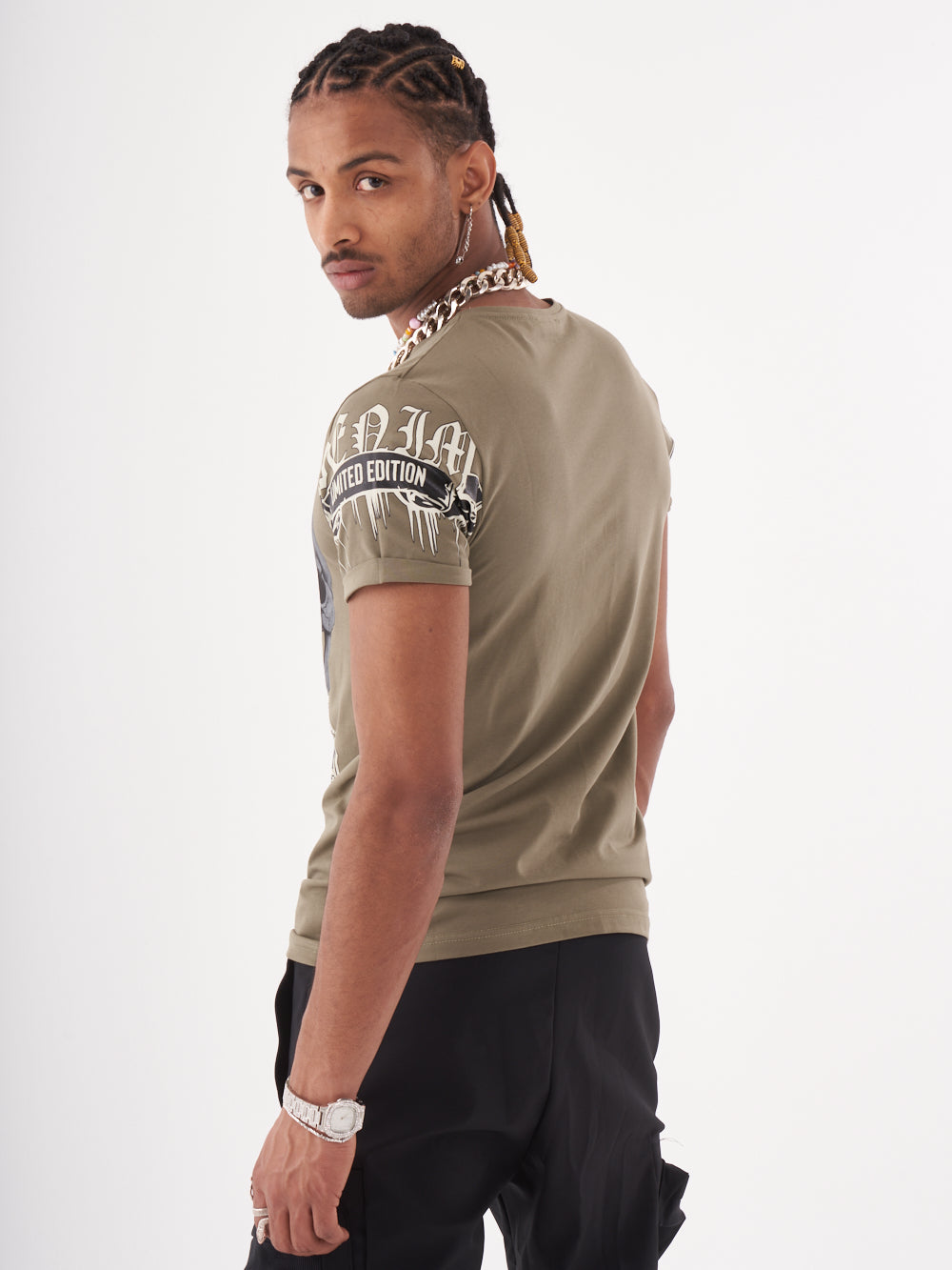 The back of a man wearing a SKULL CRUSHER T-SHIRT | GREEN.