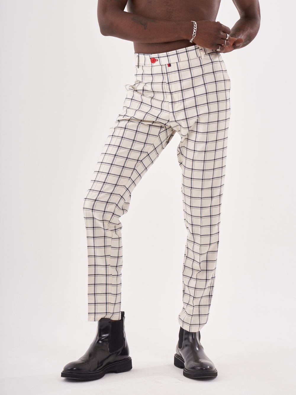 A man wearing TIMONO PANTS.