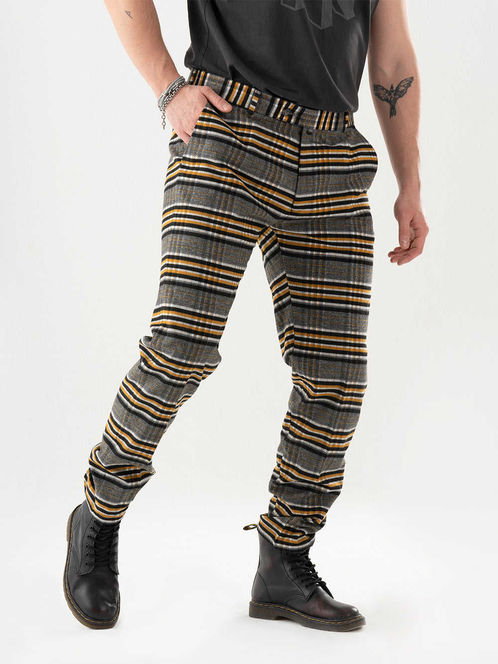 A man in GAMOR PANTS is posing in front of a white background.
