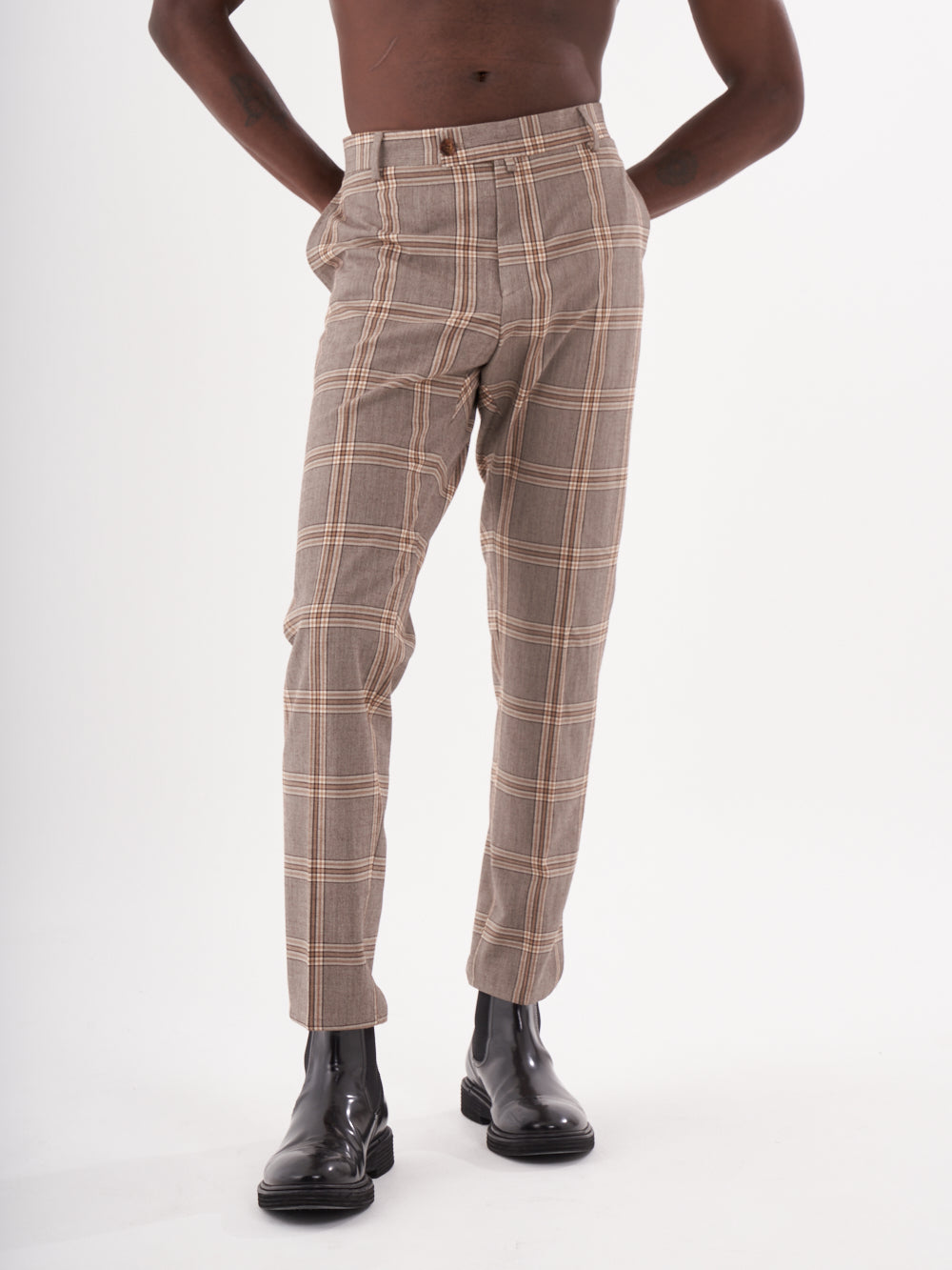 A man in ROOK PANTS is posing for a photo.