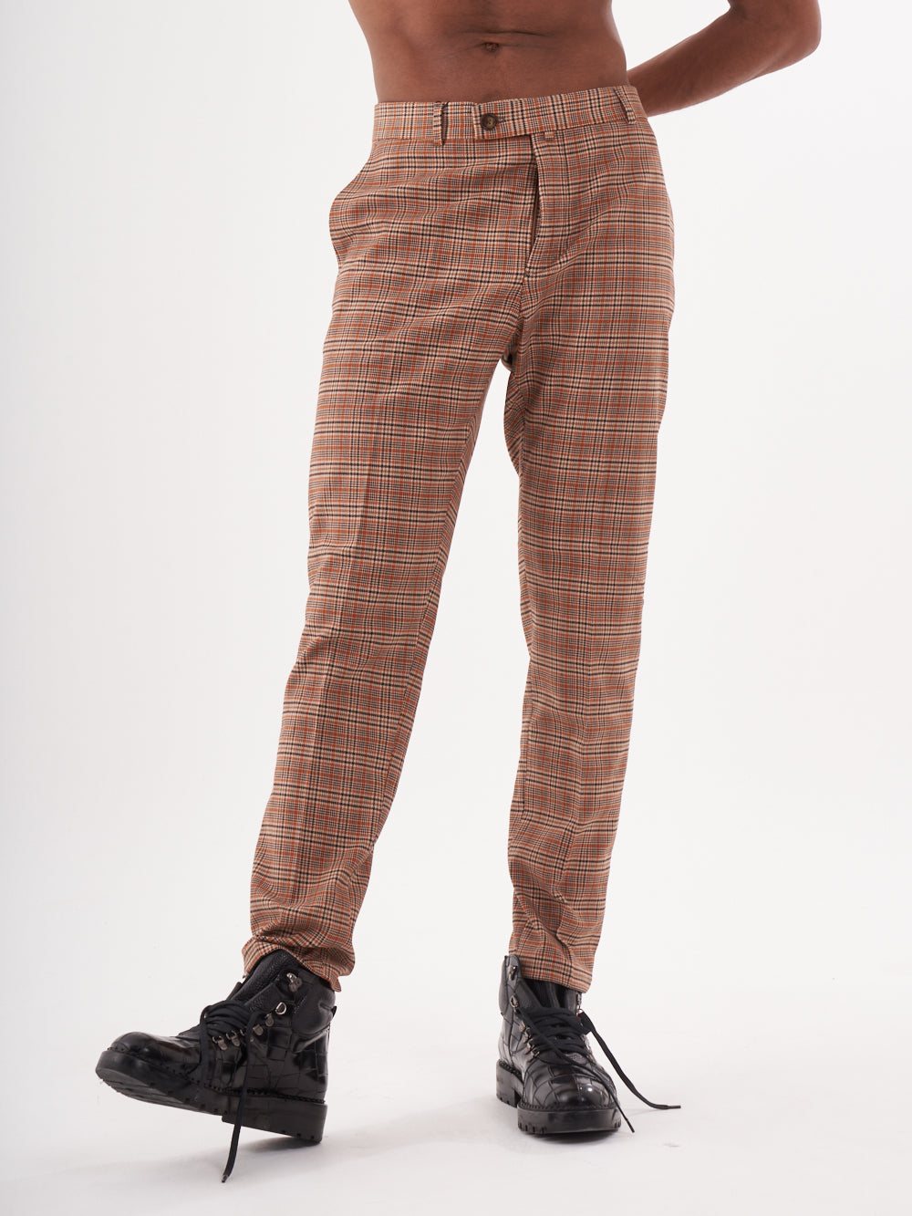 A man in SAWDUST PANTS posing for a photo.