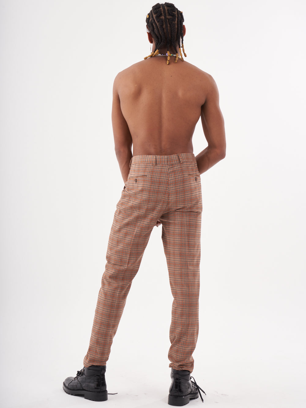 The back of a man wearing SAWDUST PANTS.