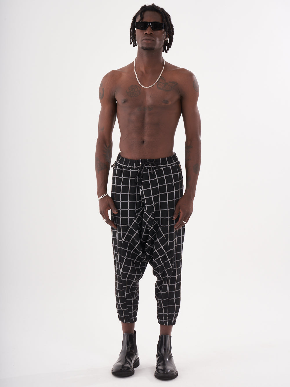 Checkered black WACKADOO JOGGERS.