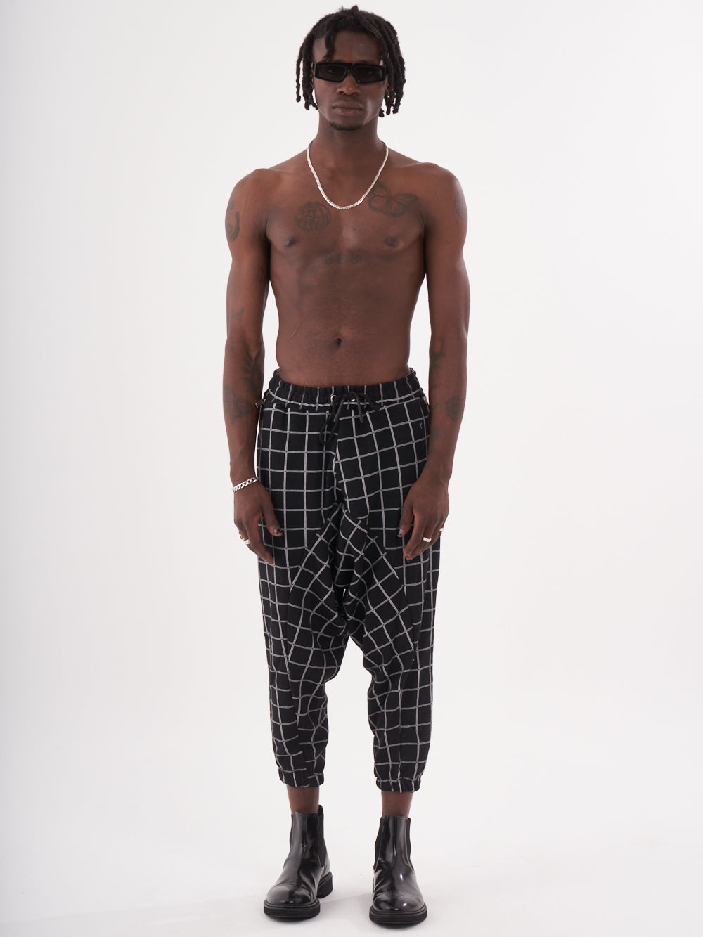 Checkered black WACKADOO JOGGERS.