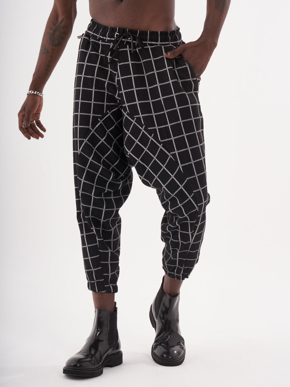 Checkered black WACKADOO JOGGERS.