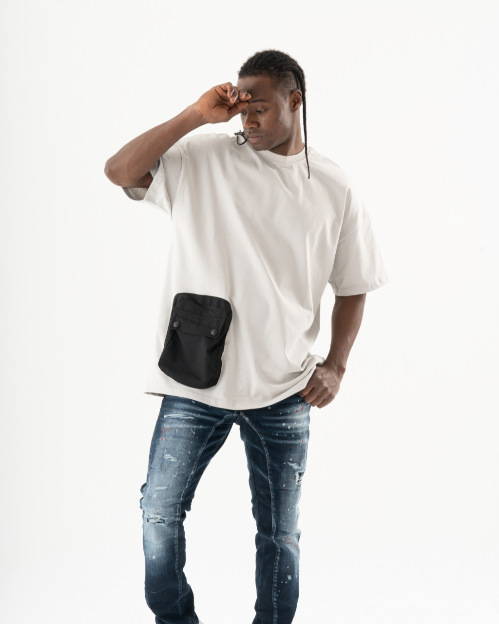 A man wearing an ELEVATE T-SHIRT with a black pocket.