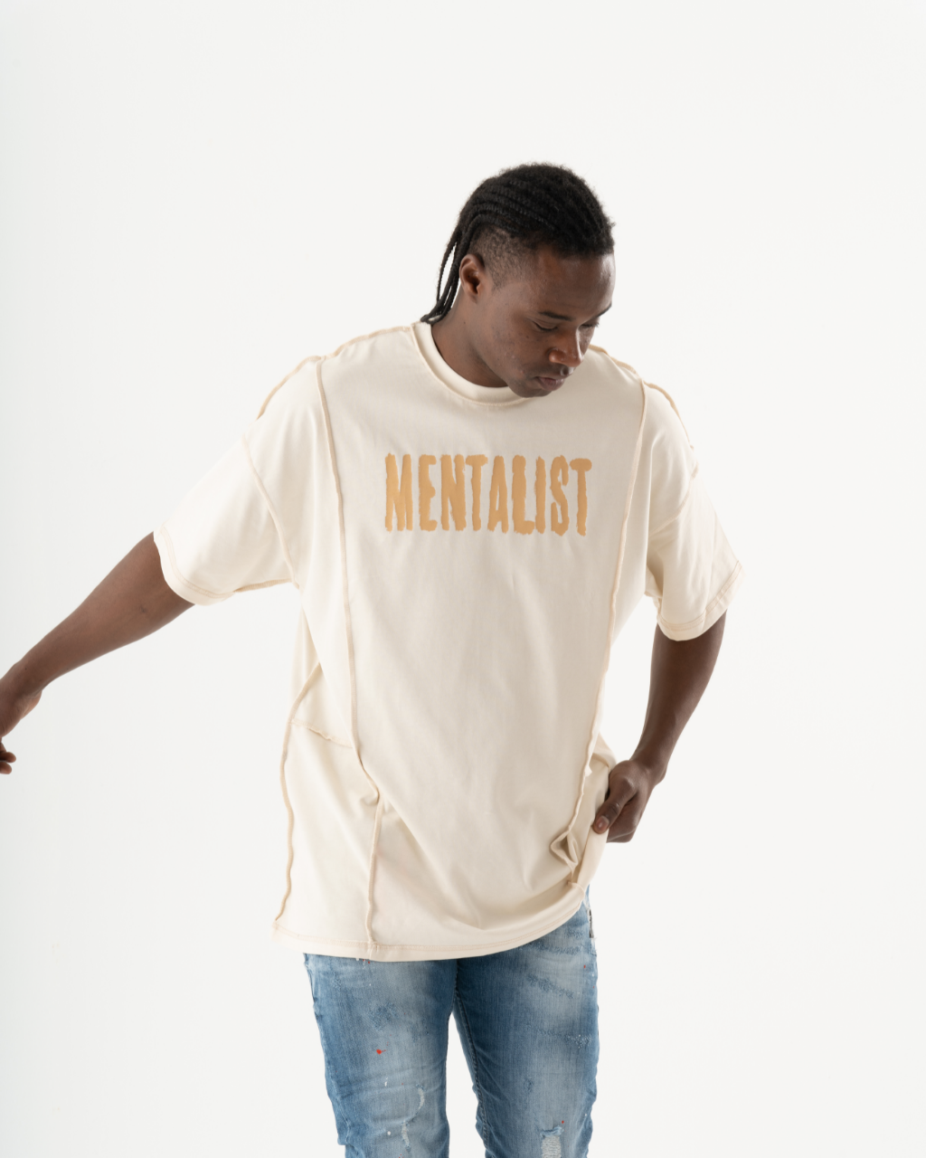A man wearing a Mentalist T-Shirt | Beige.