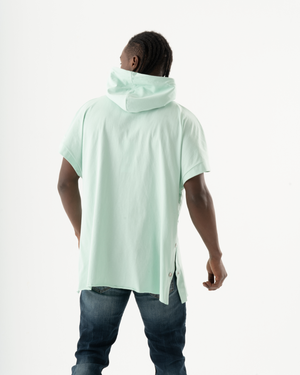 The back of a man wearing a hooded EXPLORER HOODIE.
