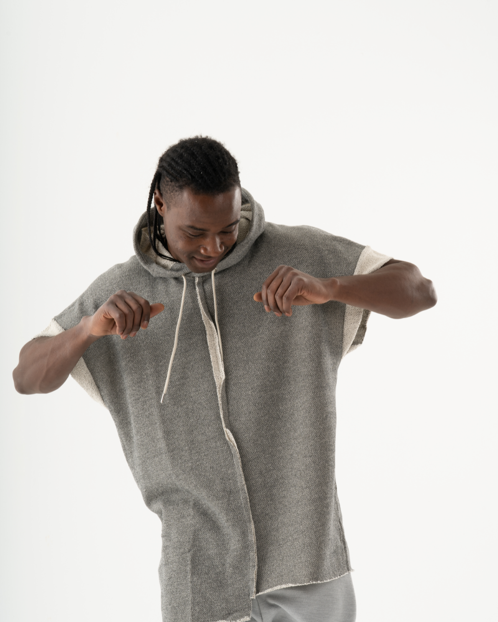 A man wearing a HAILMARY HOODIE.