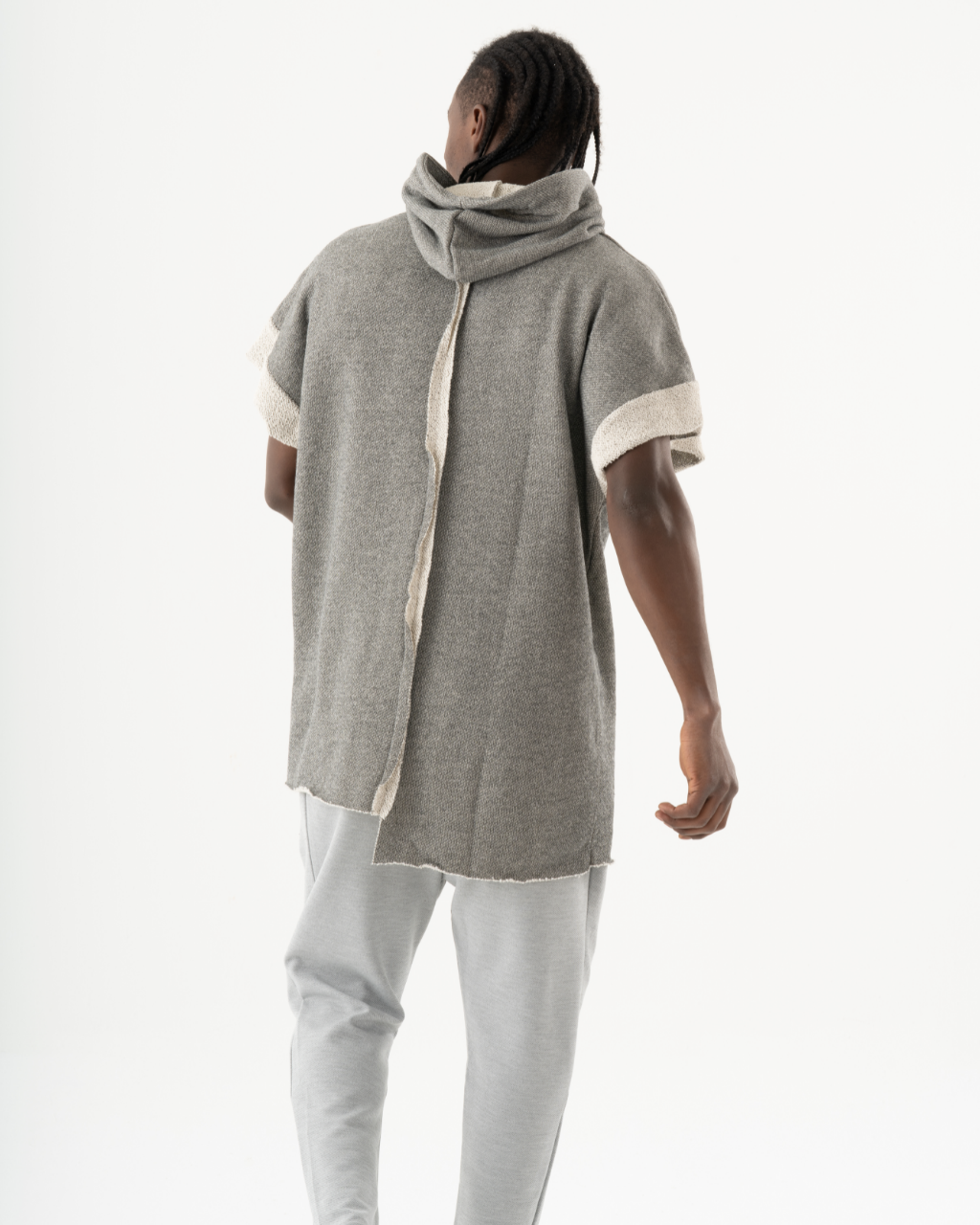 A man wearing a HAILMARY HOODIE.