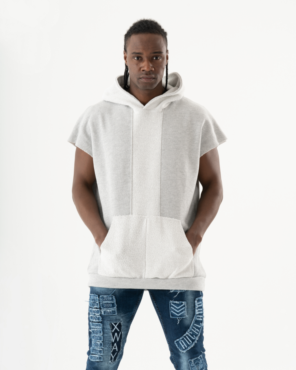 A man wearing the BACHELOR HOODIE | WHITE.