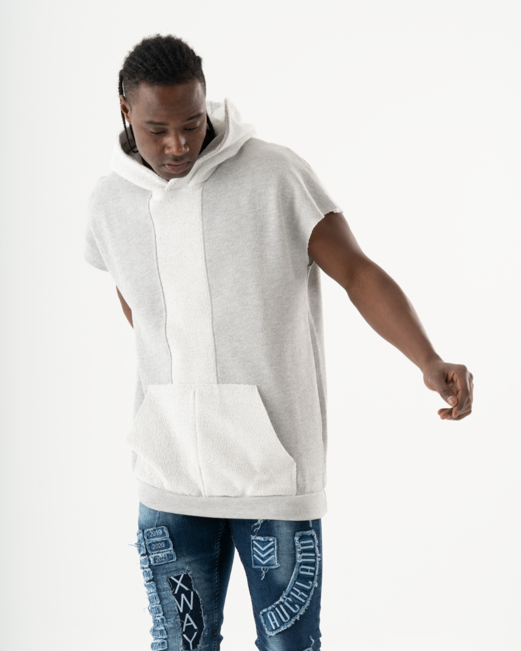 A man wearing a comfortable BACHELOR HOODIE | WHITE.