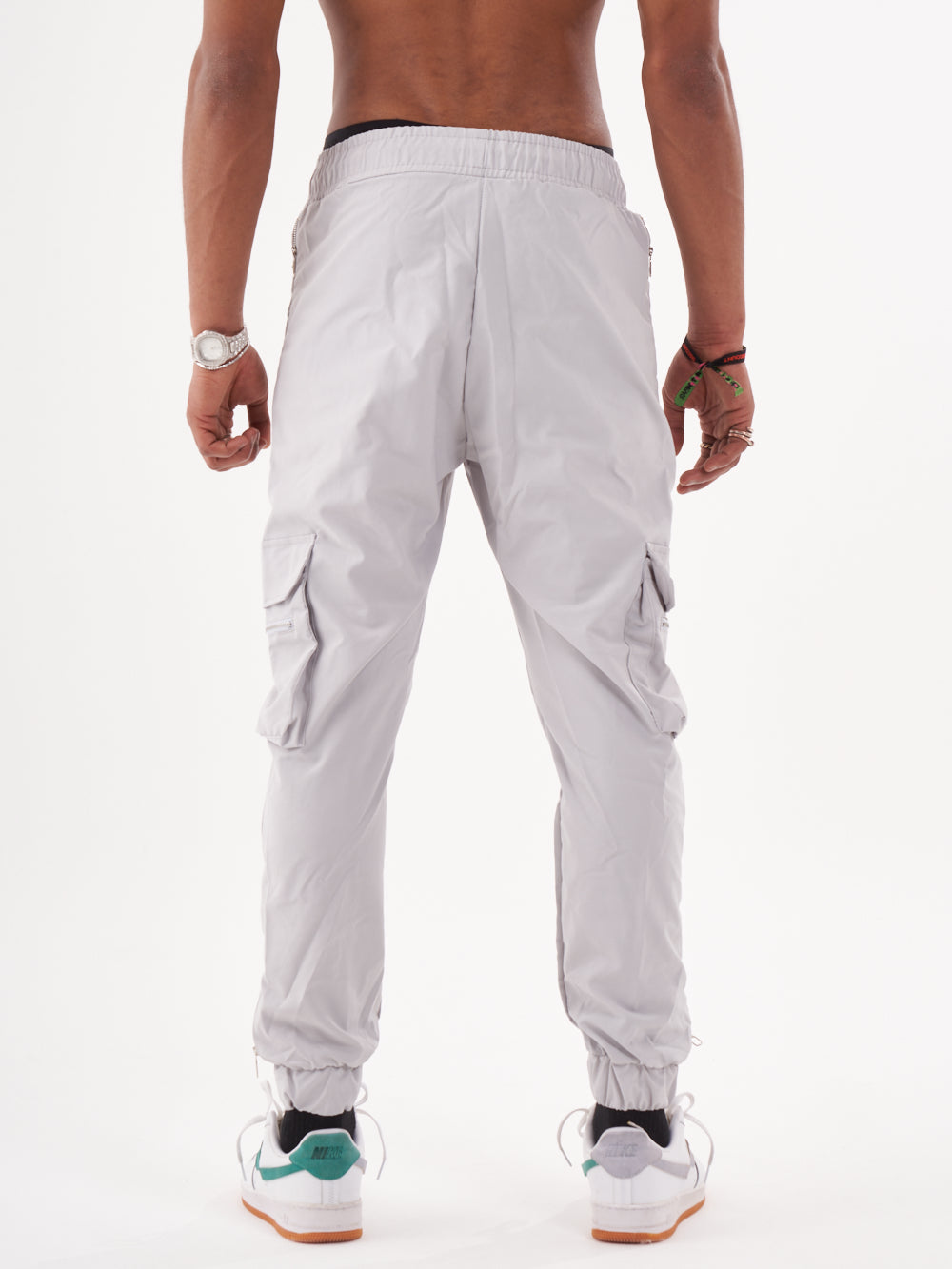 The back view of a man wearing ANARCHY JOGGERS.