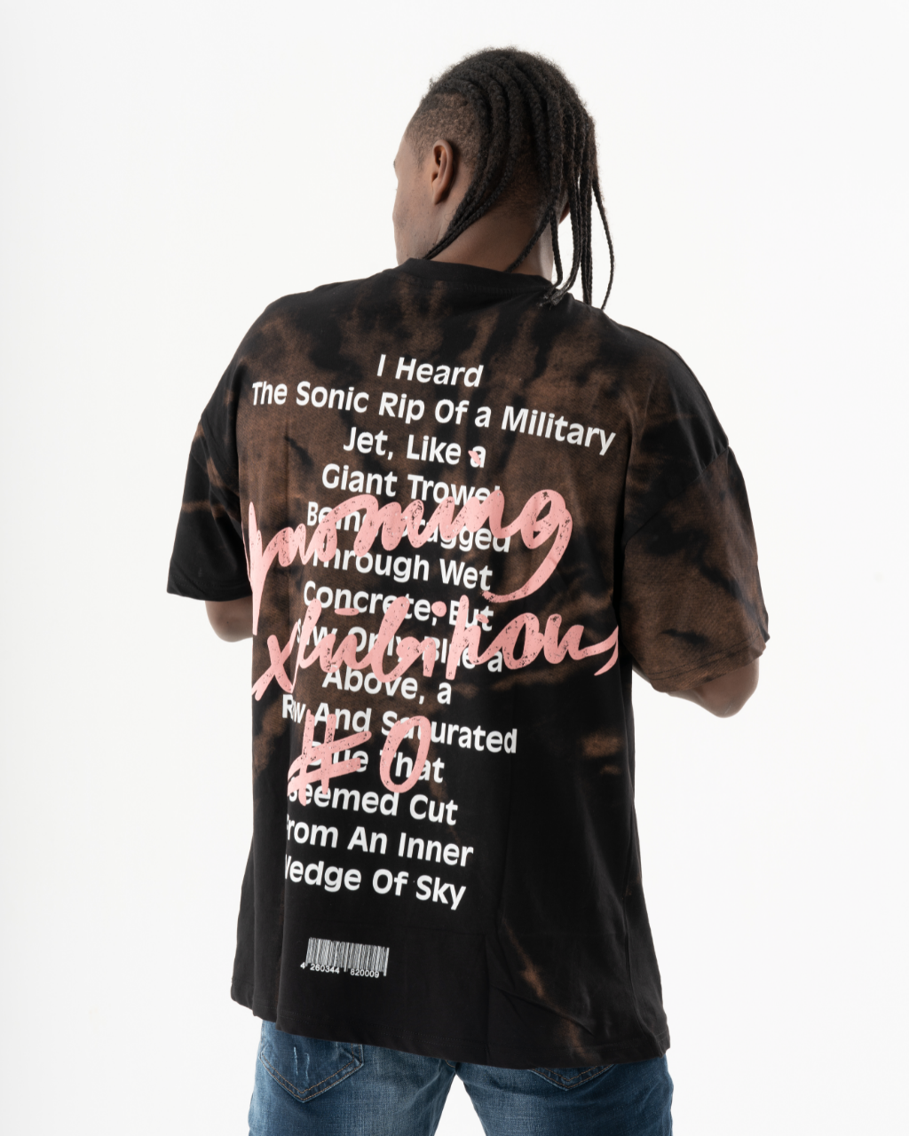The back of a man wearing an OPTIMIST T-SHIRT.