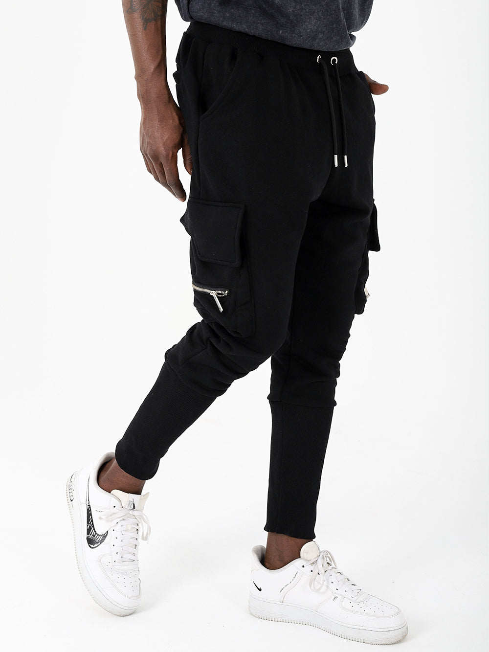 A man wearing RAMBO JOGGERS.
