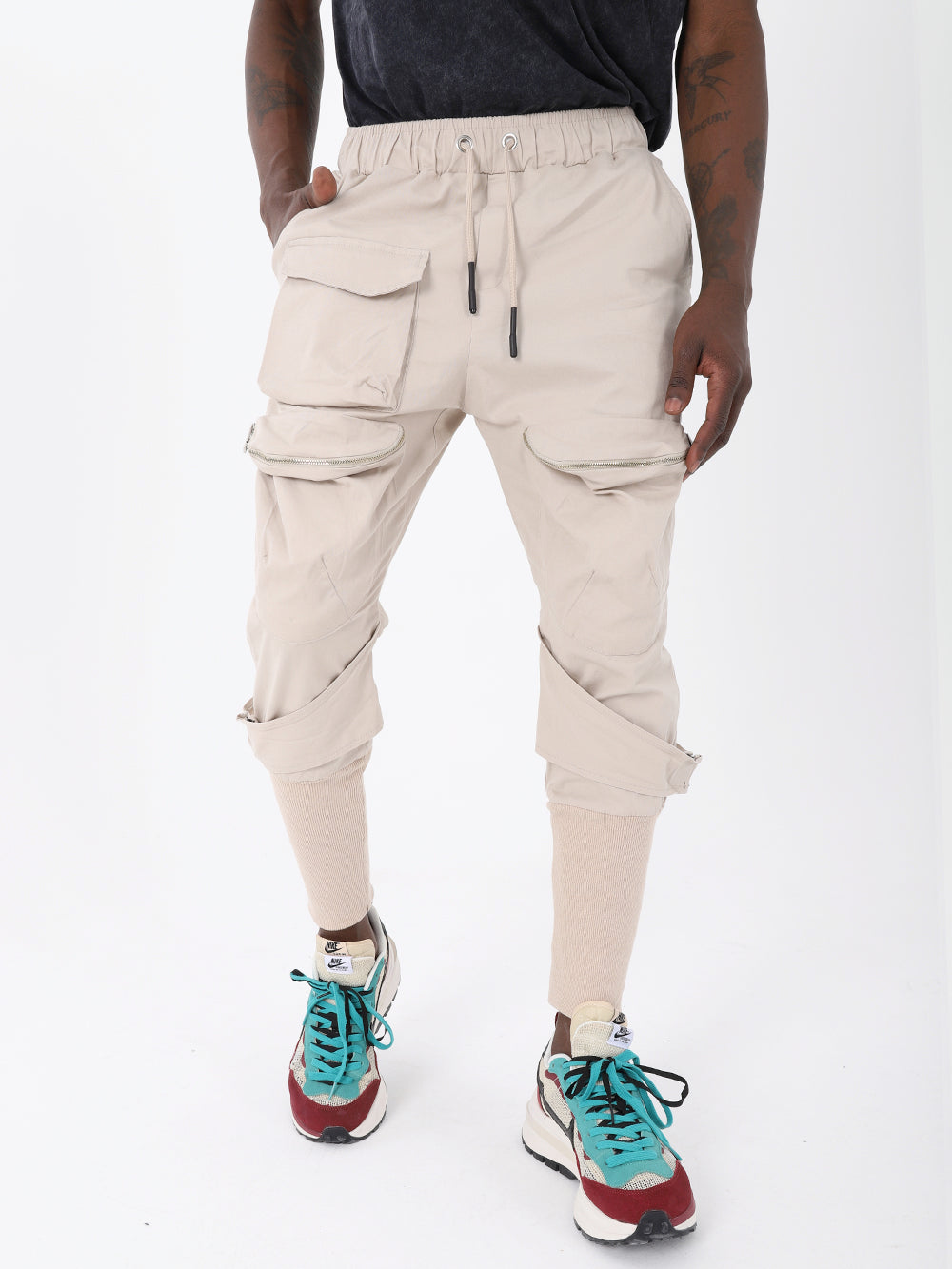 A man wearing JUPITER JOGGERS and sneakers.