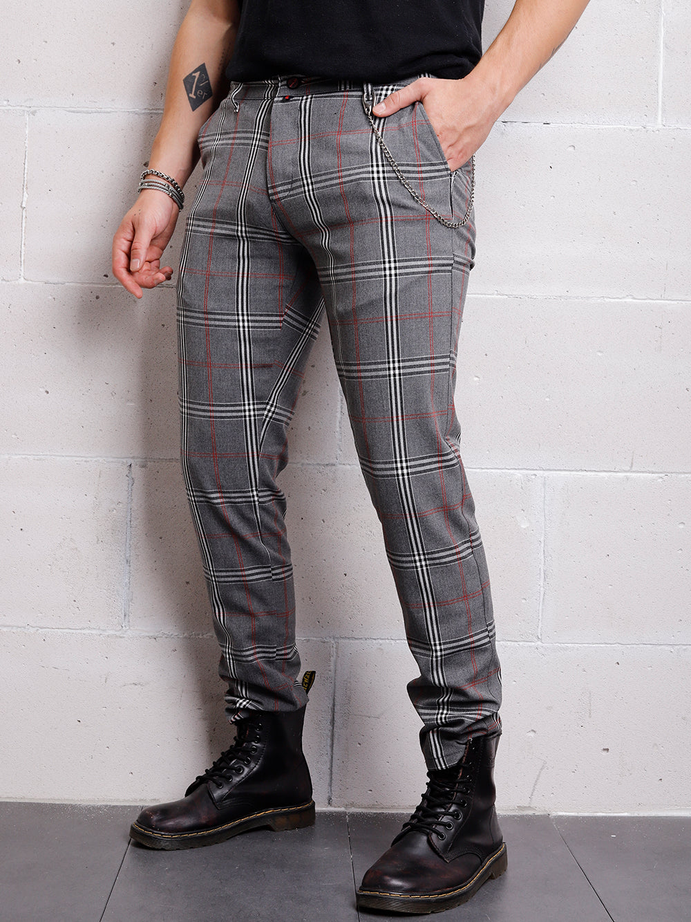 A man wearing the CHECKERED GREY pants.