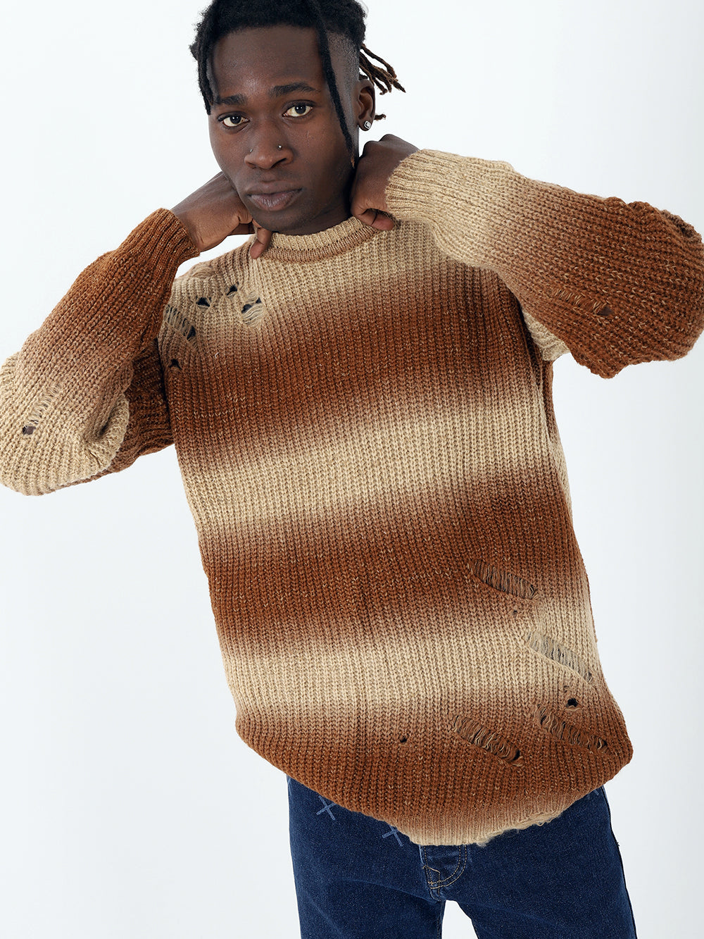 A man wearing a DISTRESSED GENTLEMAN SWEATER | BROWN.