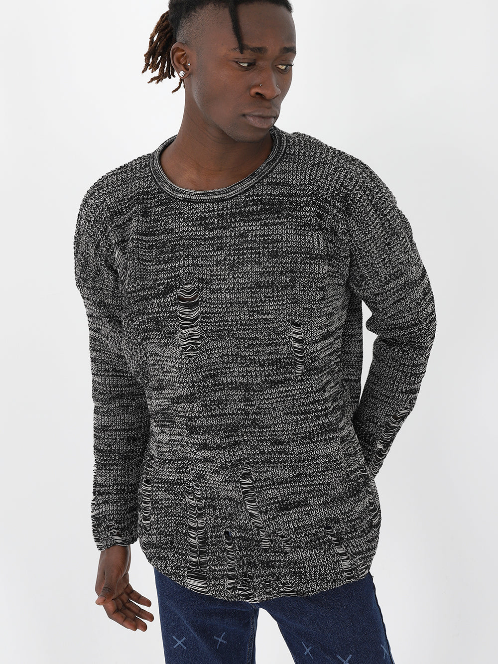 A man wearing a DISTRESSED GENTLEMAN SWEATER | GRAY.