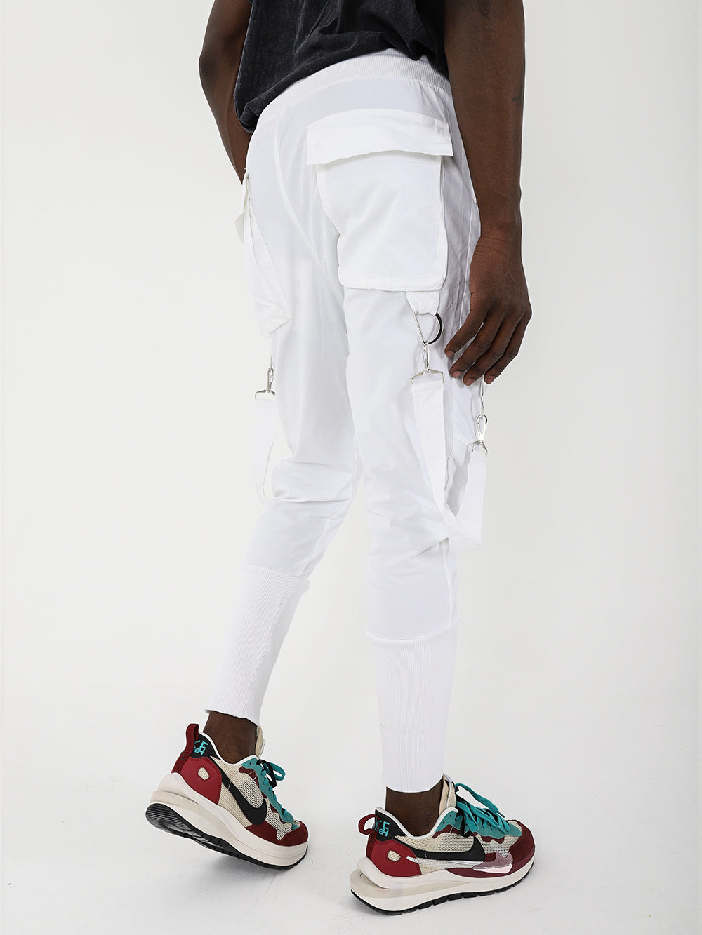 The back view of a man wearing BROOKLYN JOGGERS with an adjustable drawstring waist.