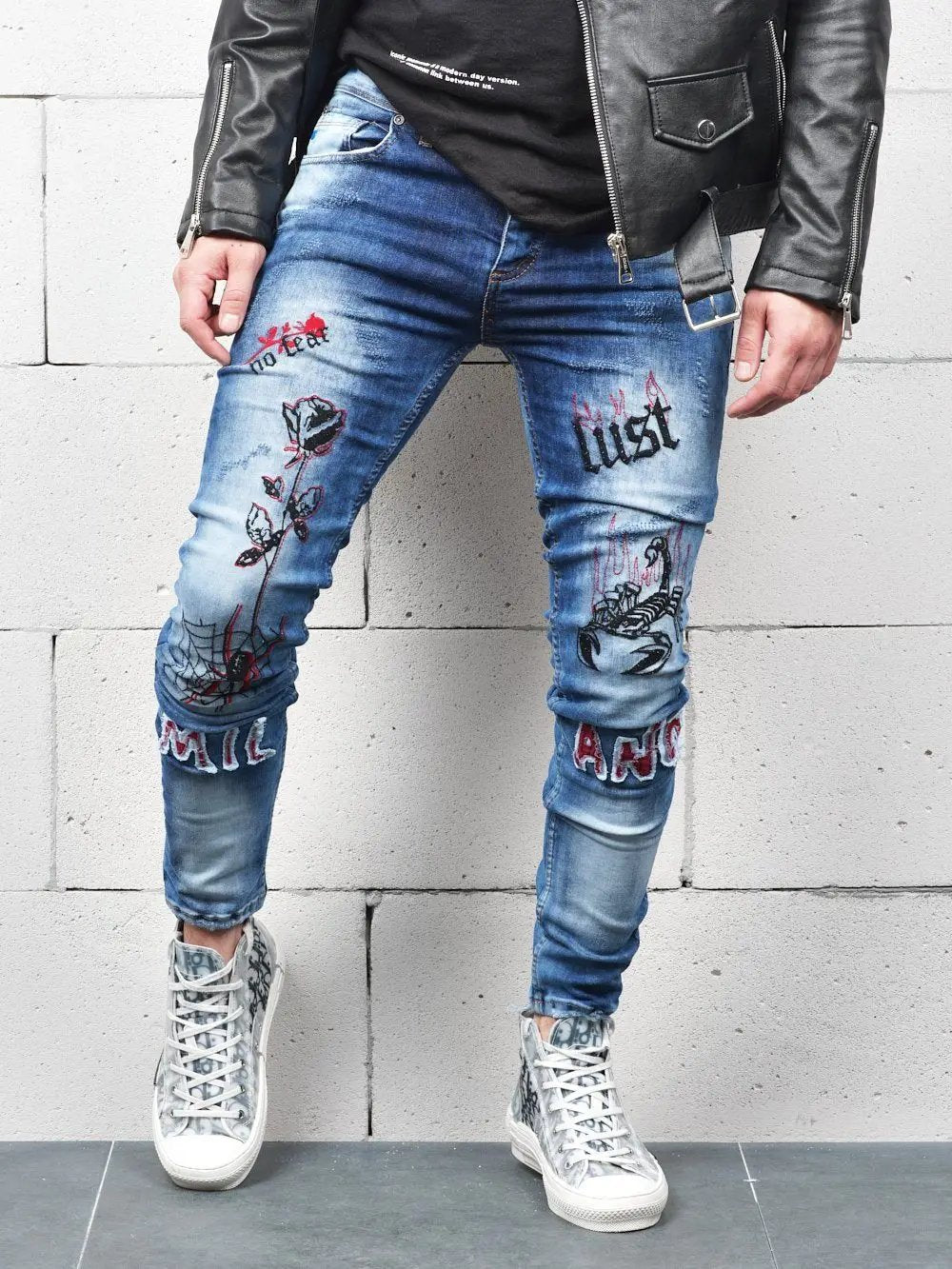 Lower body shot of a man wearing ROSE TATTOO skinny jeans 