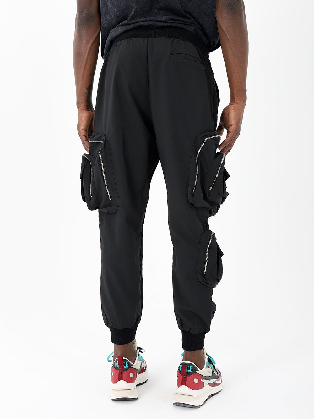 The back view of a man wearing LAVANO JOGGERS.