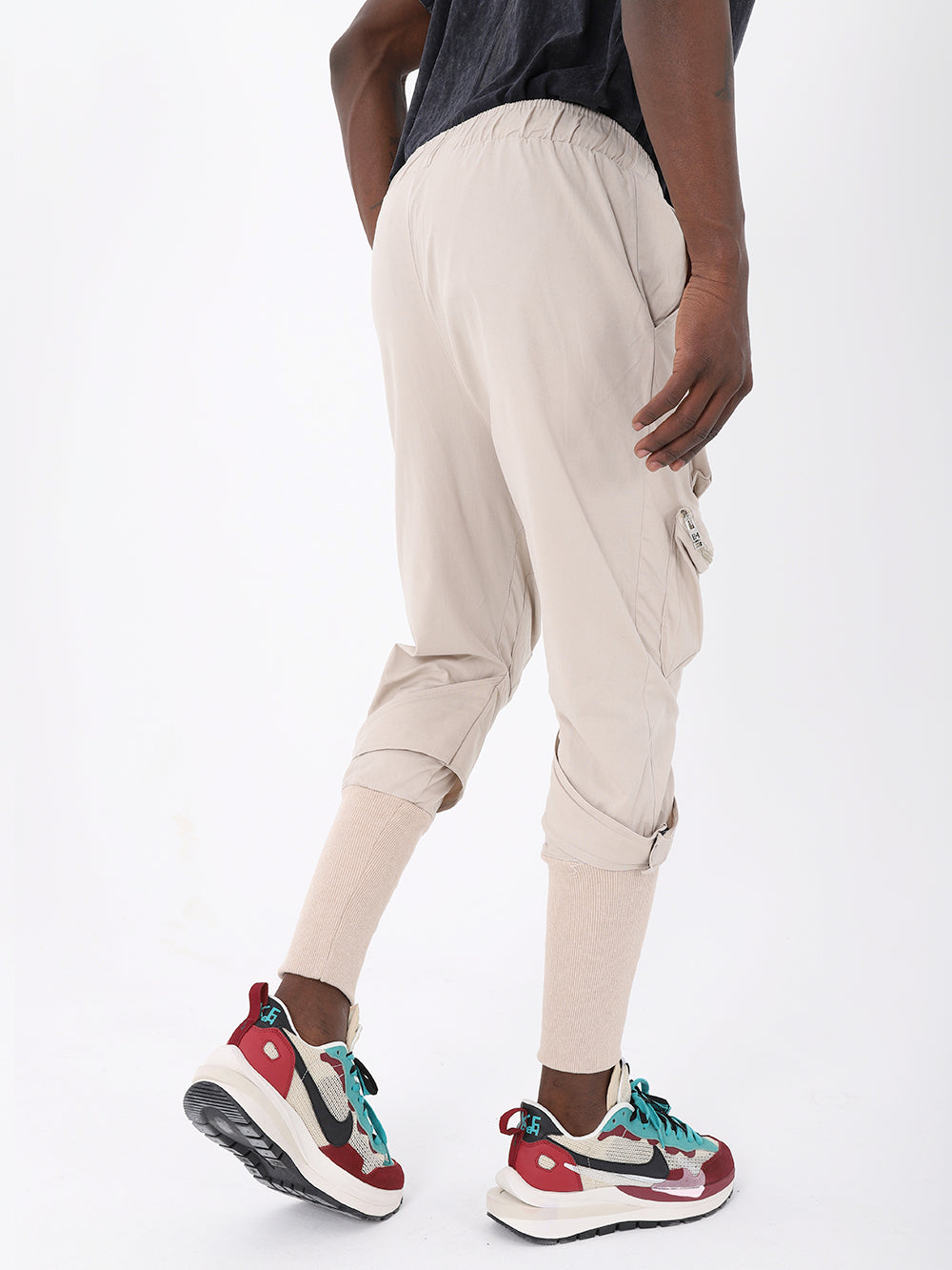 A man wearing JUPITER JOGGERS and sneakers.