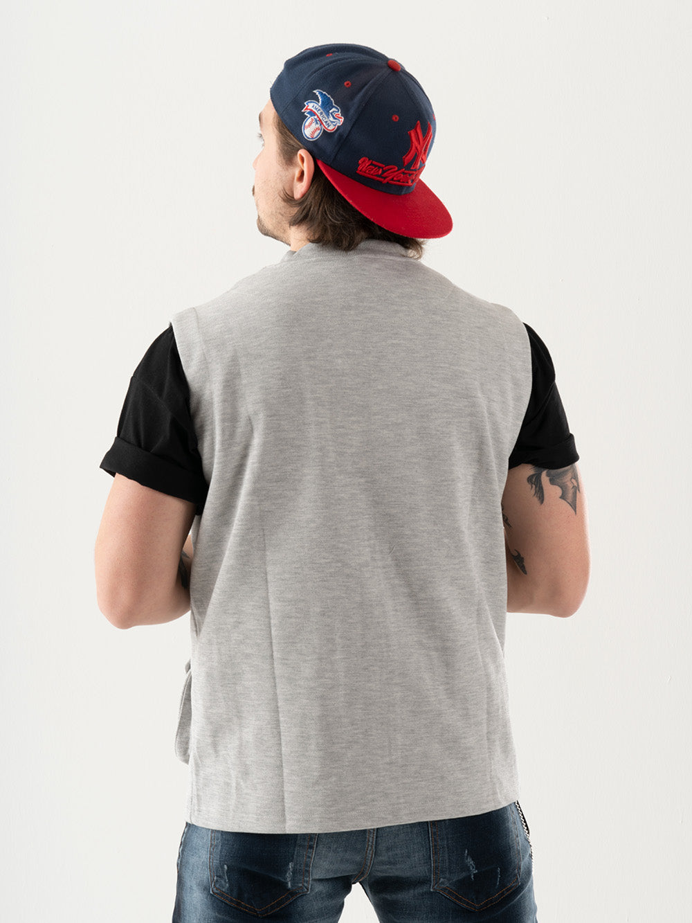 The back of a man wearing a FREESPIRIT VEST.