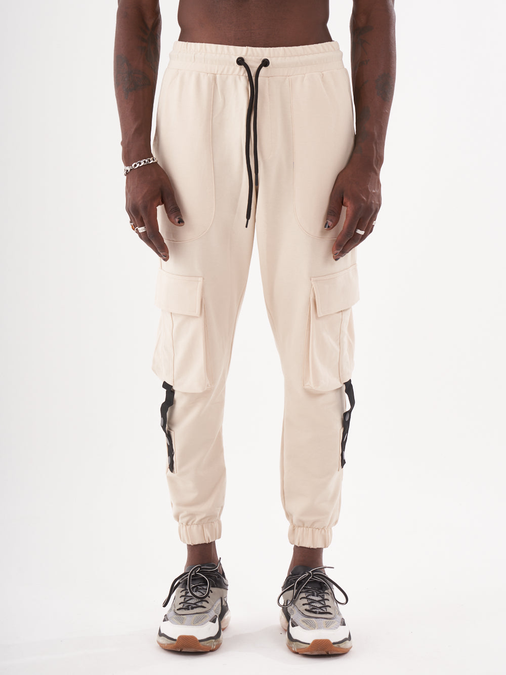 A man wearing CASCADE JOGGERS.