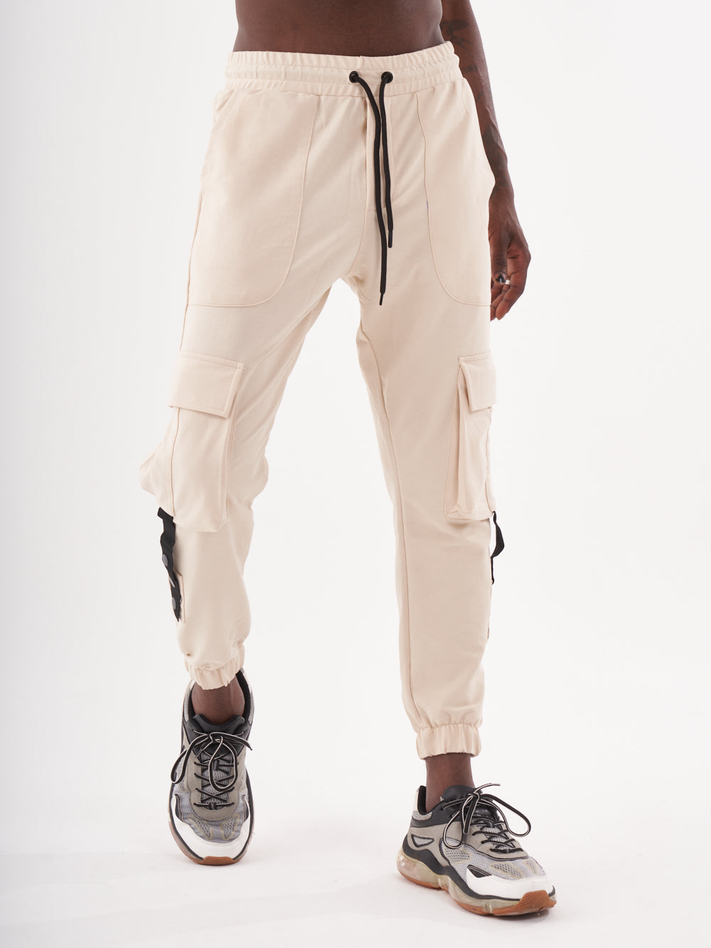 A man wearing CASCADE JOGGERS.