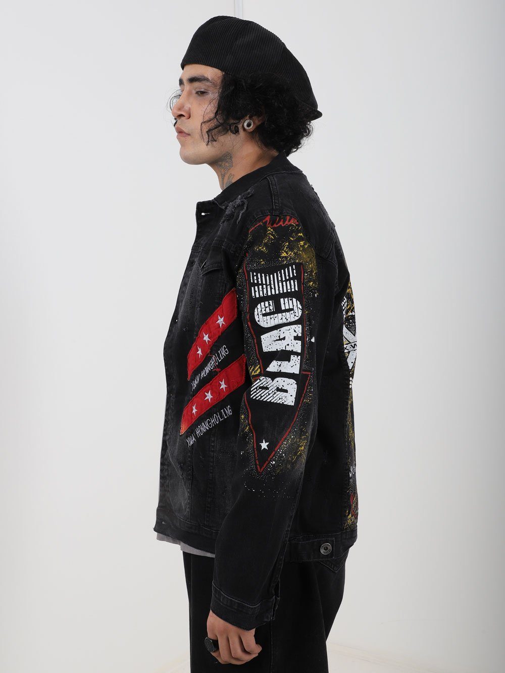 Side shot of a man wearing THE CAPTAIN Denim Jacket by SERNES