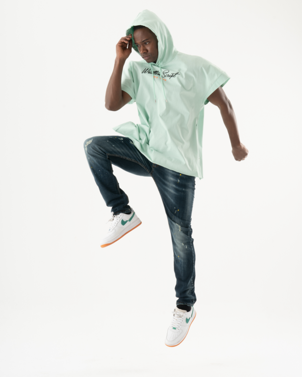 A man in KUDOS is jumping.