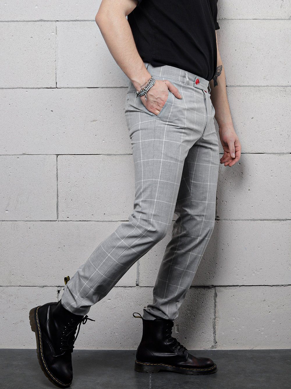 A man wearing ICED AMERICANO PANTS and a t-shirt.