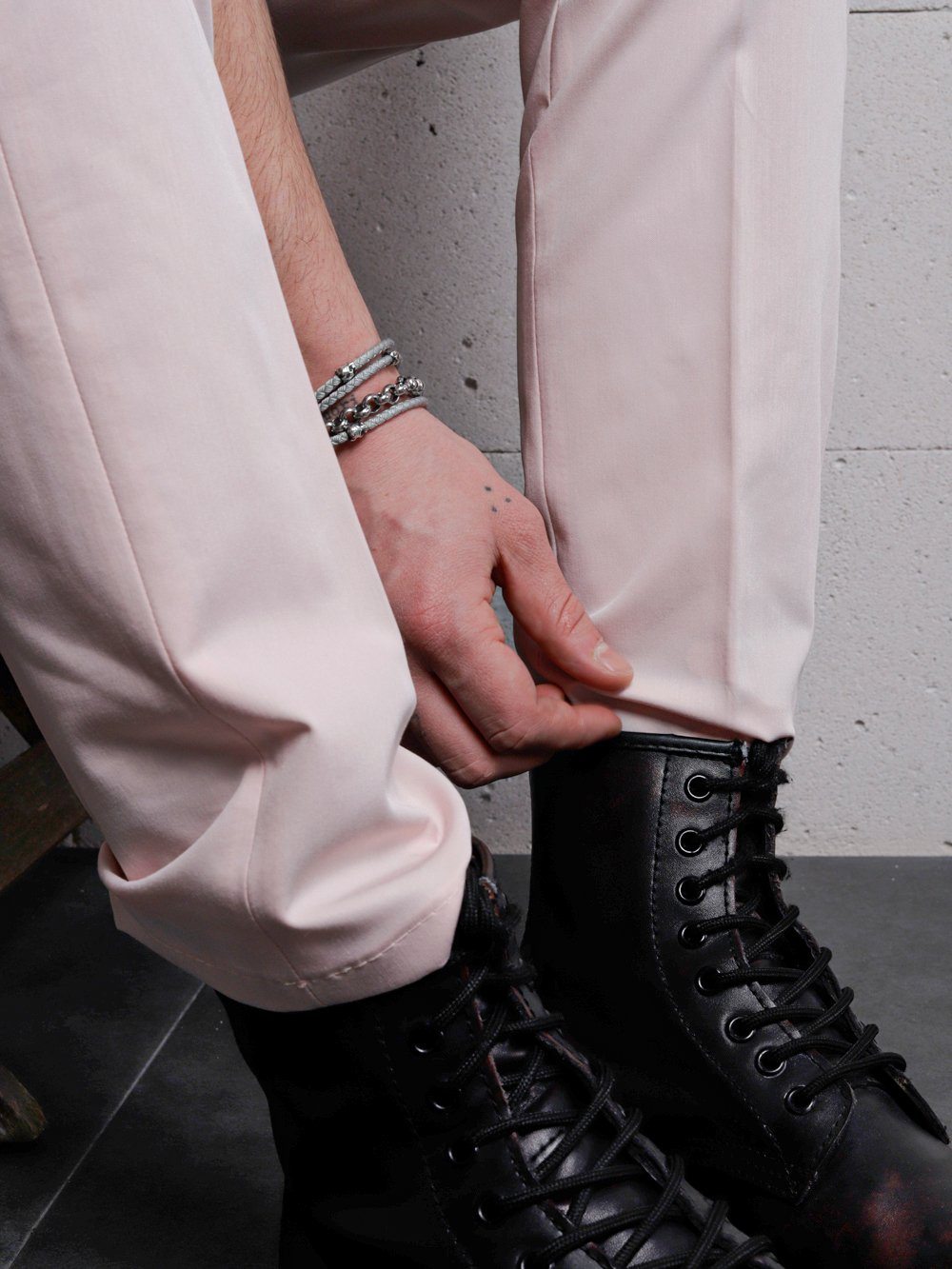 A man wearing a pair of Candy Dust Pants.