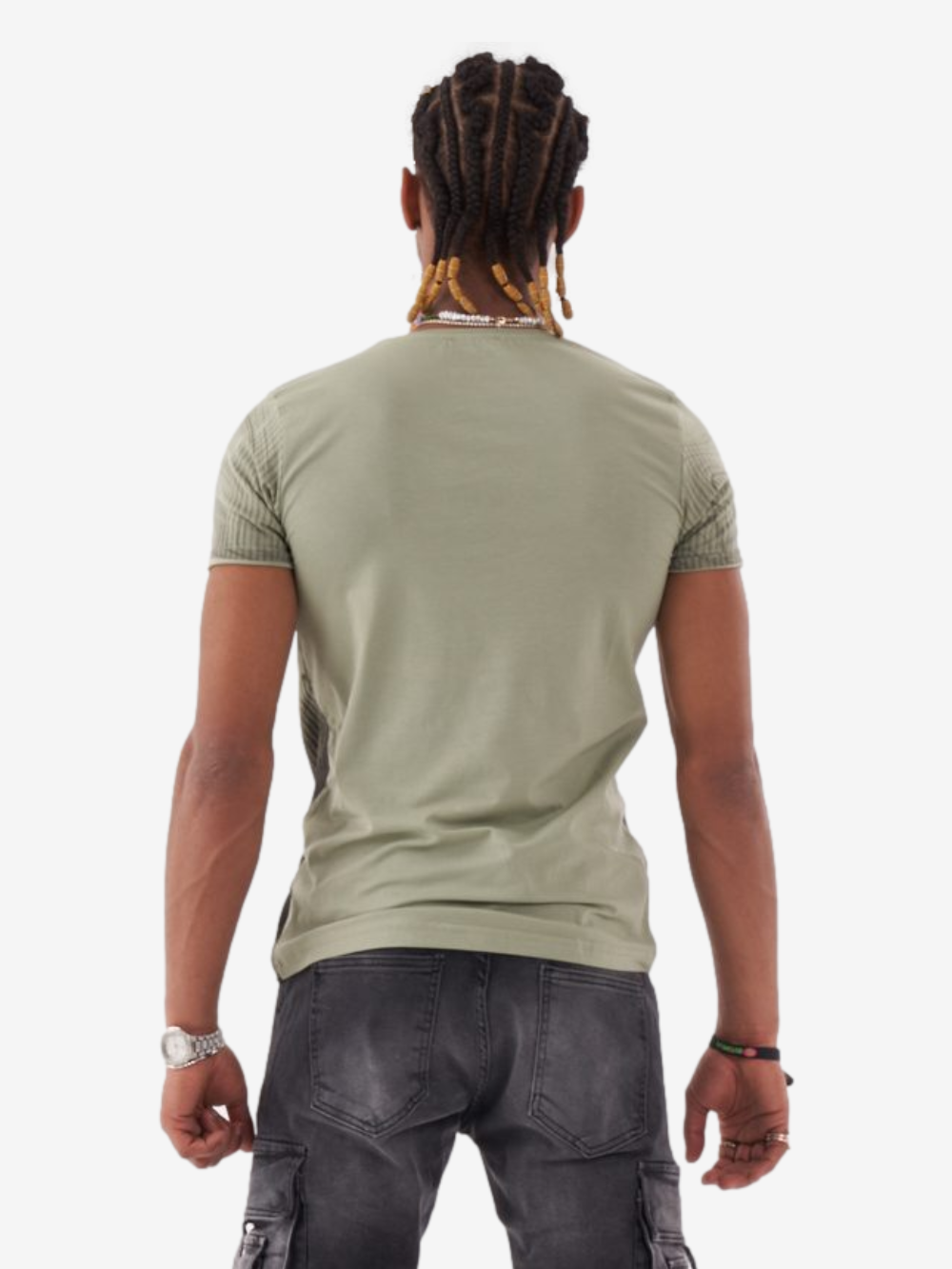 The back view of a man wearing a NIRVANA T-SHIRT | GREEN.