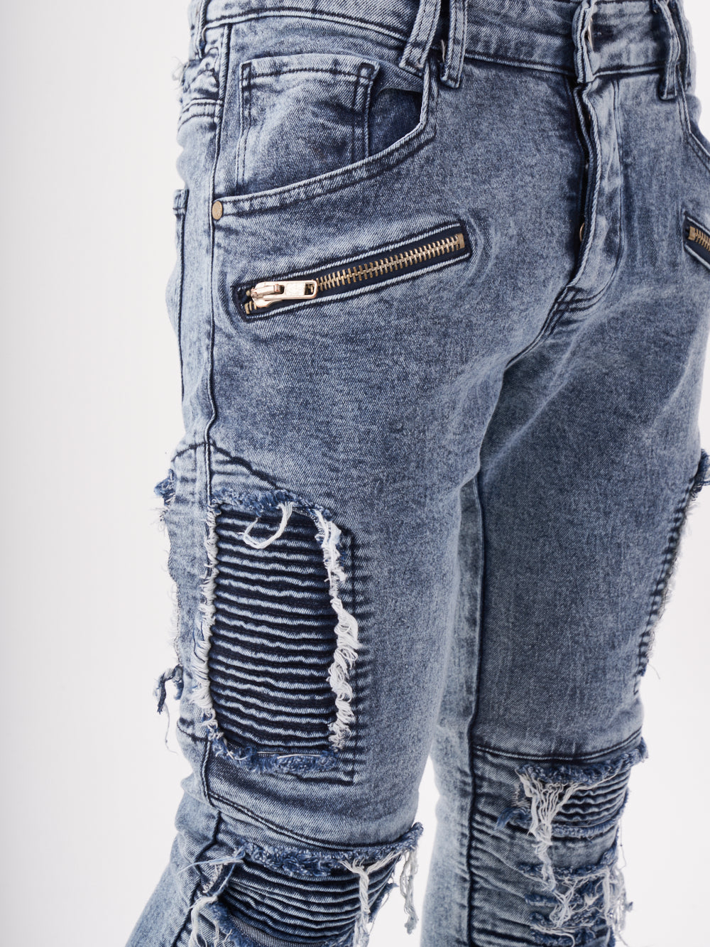 The back view of a man wearing RADICAL jeans.