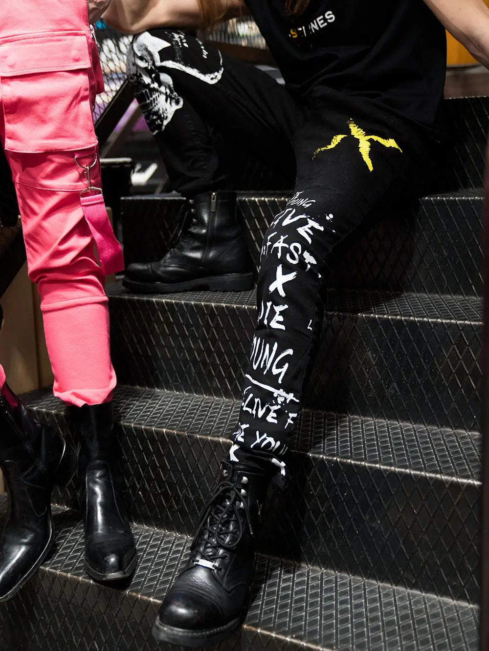 A woman is sitting on a DEAN.