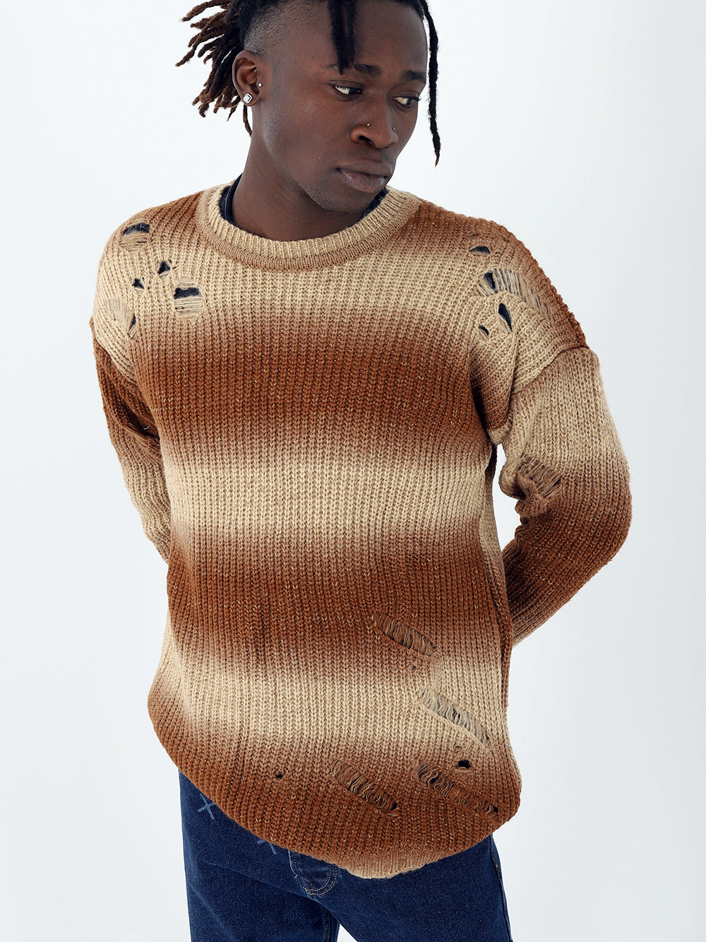 A man with dreadlocks wearing a Distressed Gentleman Sweater | Brown.