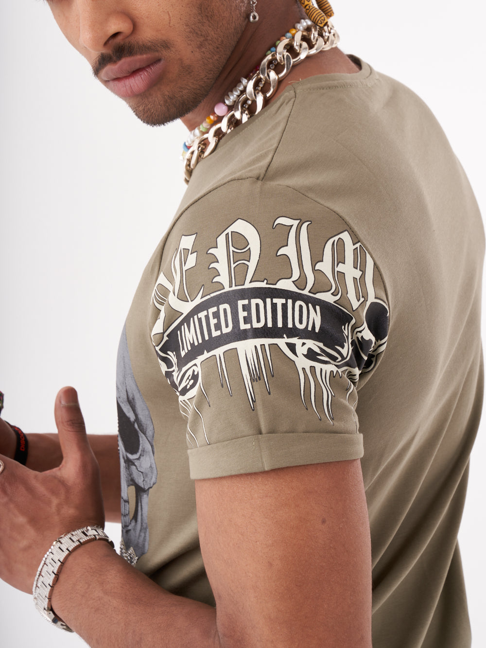 A limited edition, slim fit SKULL CRUSHER T-SHIRT | GREEN featuring a skull design.