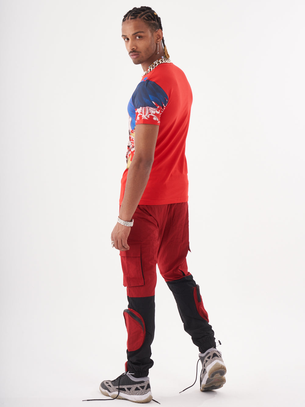 A man wearing the EUPHORIA T-SHIRT | RED.