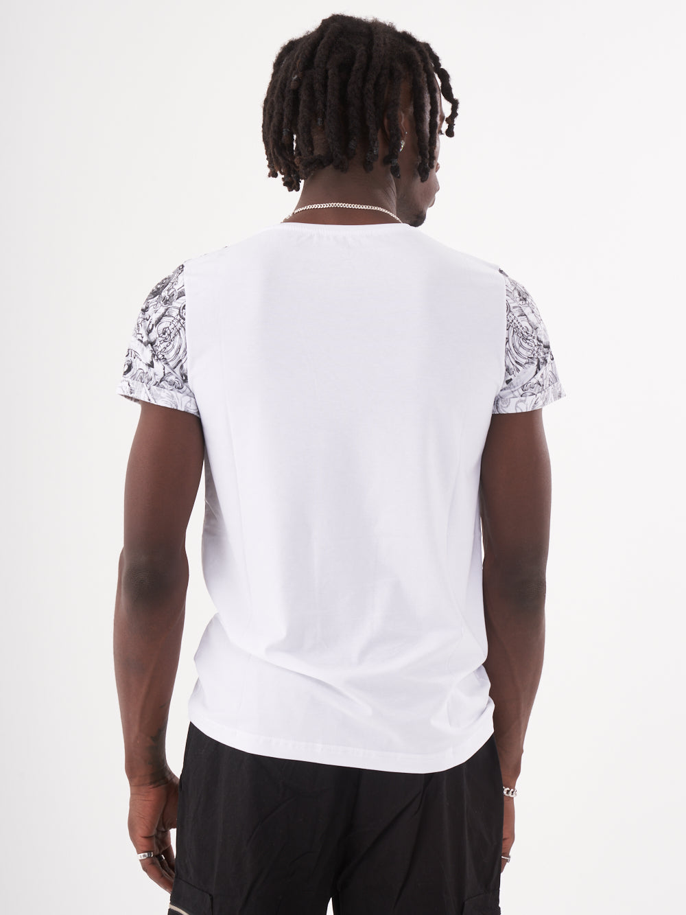 The back view of a man wearing the Trinity T-Shirt | White.