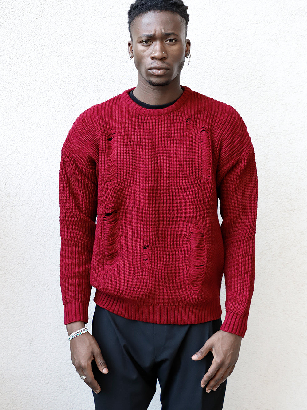 A fit man wearing a Distressed Gentleman Sweater | Burgundy.